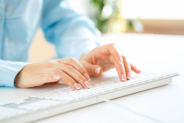 istock Woman office worker typing on the keyboard 513500350