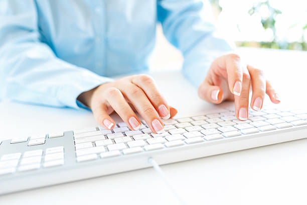 istock Woman office worker typing on the keyboard 513500486