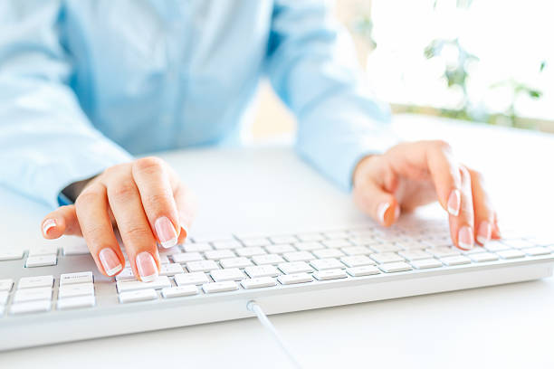 istock Woman office worker typing on the keyboard 513500530