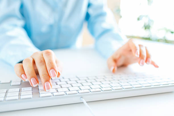 istock Woman office worker typing on the keyboard 513500584