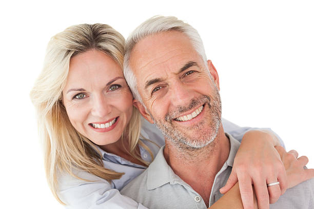 Close up portrait of happy mature couple Close up portrait of happy mature couple over white background cute couple stock pictures, royalty-free photos & images