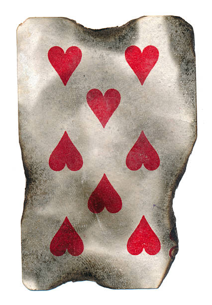 istock old burnt playing card of hearts 513530177