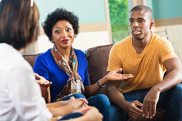 istock Serious discussion happening in a support group or Bible study 513531631