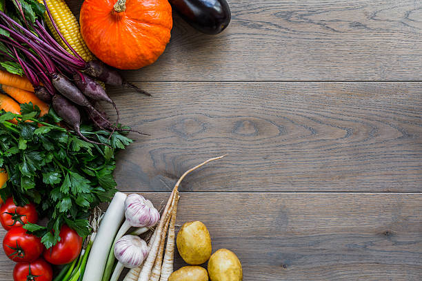 istock Vegetables on wooden table from top. 513535054