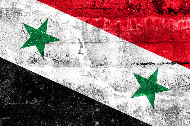 istock Syria Flag painted on grunge wall 513535427