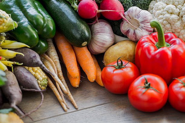 istock Vegetables on wooden table from top. 513535692