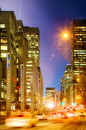 Night traffic on Robert Bourrassa boulevard downtown Montreal on a clear winter night. Low ISO, some grain visible.