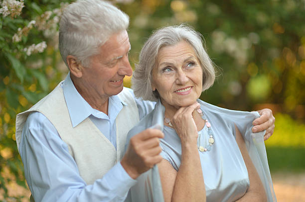 istock mature couple   in summer park 513537946