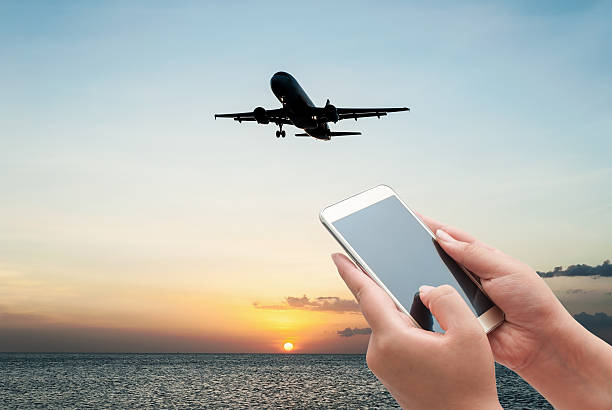 istock The women using smartphone on plane airline 513541984