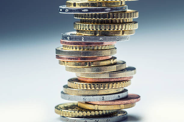 istock Coins stacked on each other in different positions. Money concept 513542310