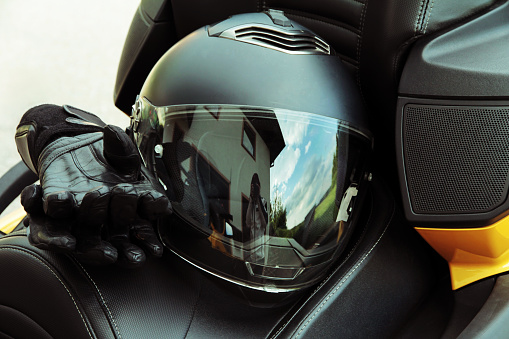 Protective clothing and safety in motorsport. Motorcycle helmet and gloves