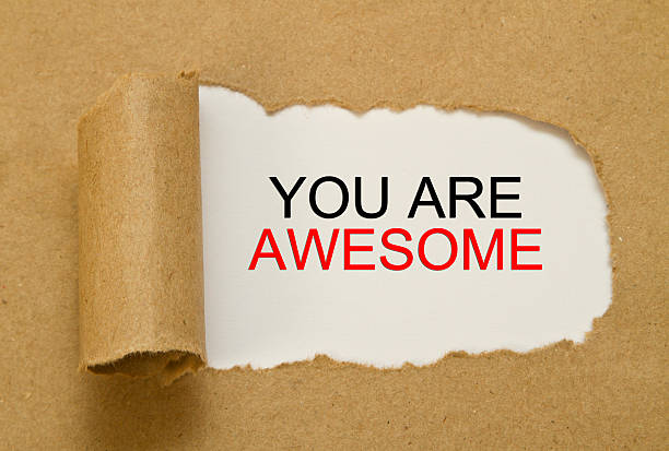 istock You are awesome message written under torn paper 513548272