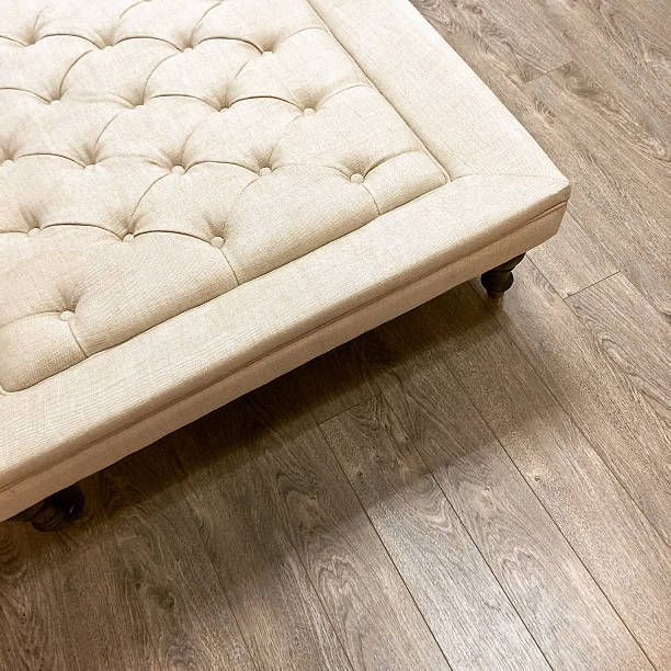 istock Fancy ottoman on wooden floor 513549076