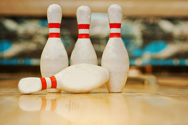 istock Four pins  at bowling wooden alley 513550980