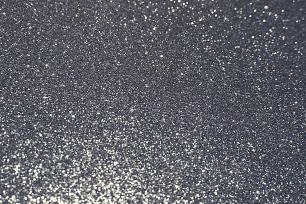 istock Silver glittering christmas lights. Blurred abstract background 513554388
