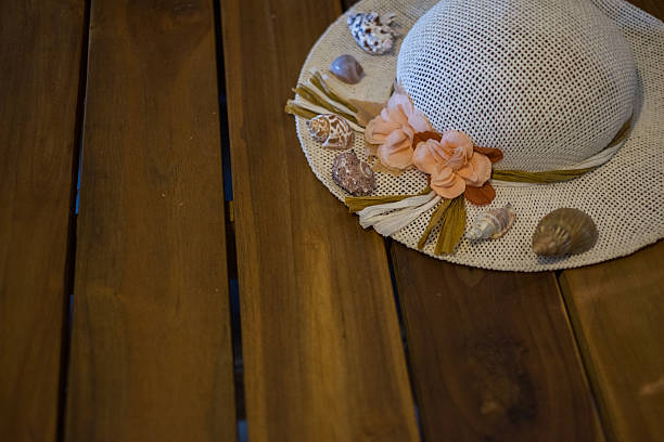 istock beautiful women sun hat with shells and copy space 513555118