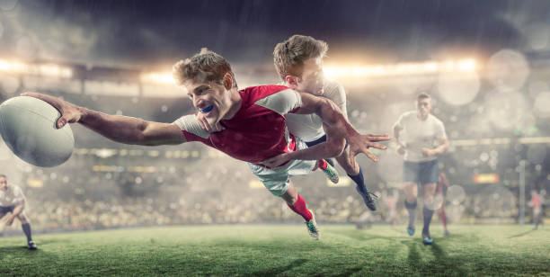istock Rugby Player Diving To Score During Tackle in Rugby Game 513555302