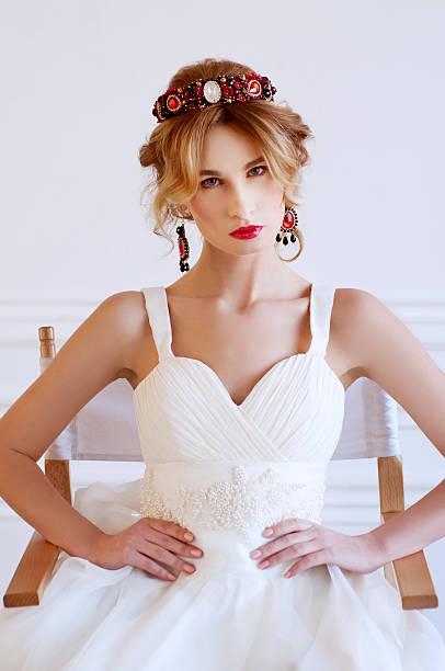 istock Beautiful royal bride wearing gorgeous beaded headpiece 513555650