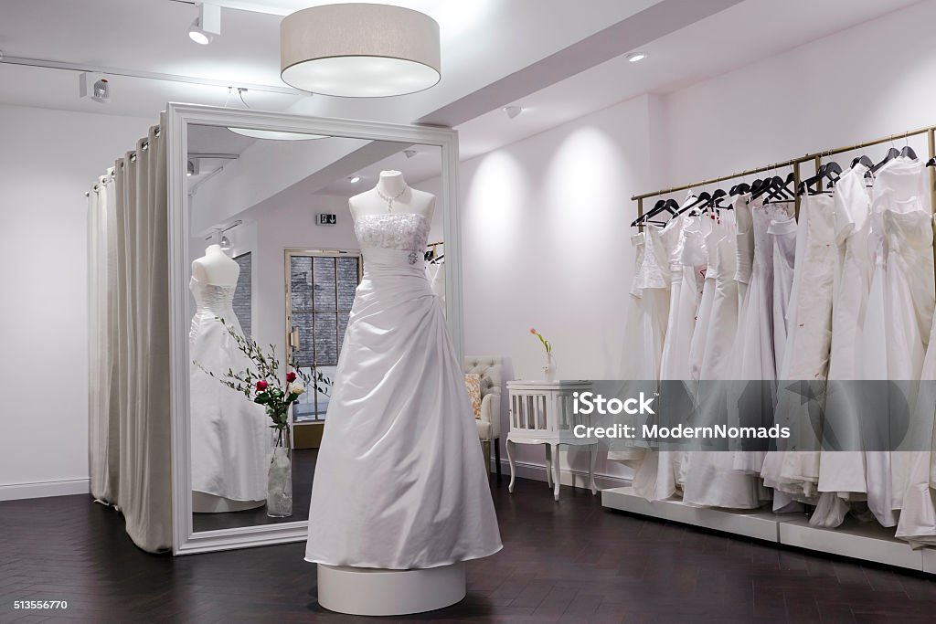 Bridal shop, store, mannequin and large mirror, changing room Changing room at a bridal shop, mannequin and large mirror Wedding Dress Stock Photo