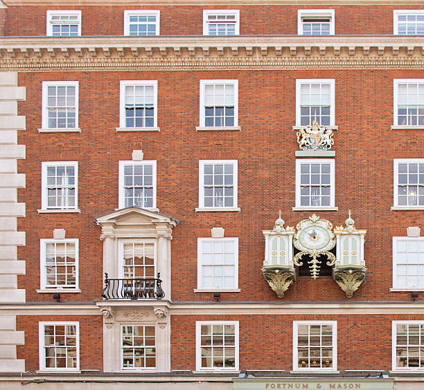 London, UK - March 27, 2015: Facade of Fortnum and Mason, famous food shop and tourist attraction on Piccadilly, London, UK.