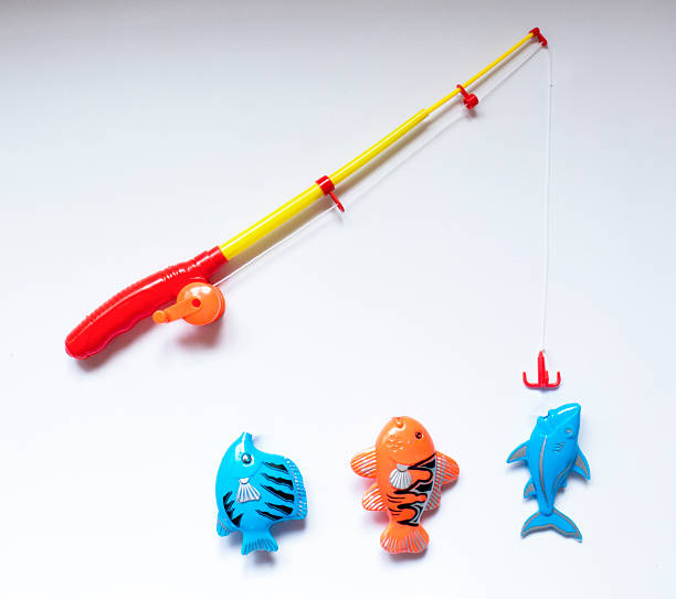 Funny Toy Background About Fishing Stock Photo - Download Image Now -  Fishing Rod, Toy, Cut Out - iStock