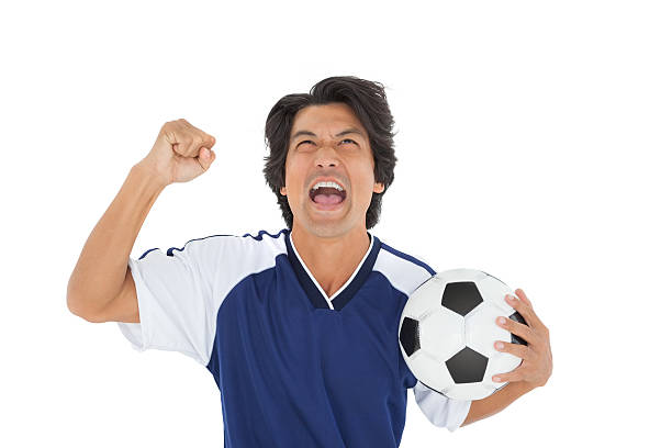 istock Athletic football player cheering 513566831