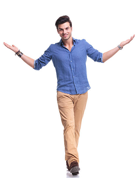 istock man walking forward and welcoming you 513569305
