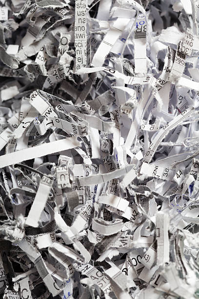 istock Closeup of shredded paper as abstract background 513569445