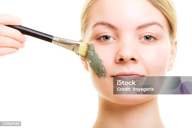 Skin Care Woman Applying Clay Mud Mask On Face Stock Photo - Download Image Now - Adult, Algae, Anti Aging