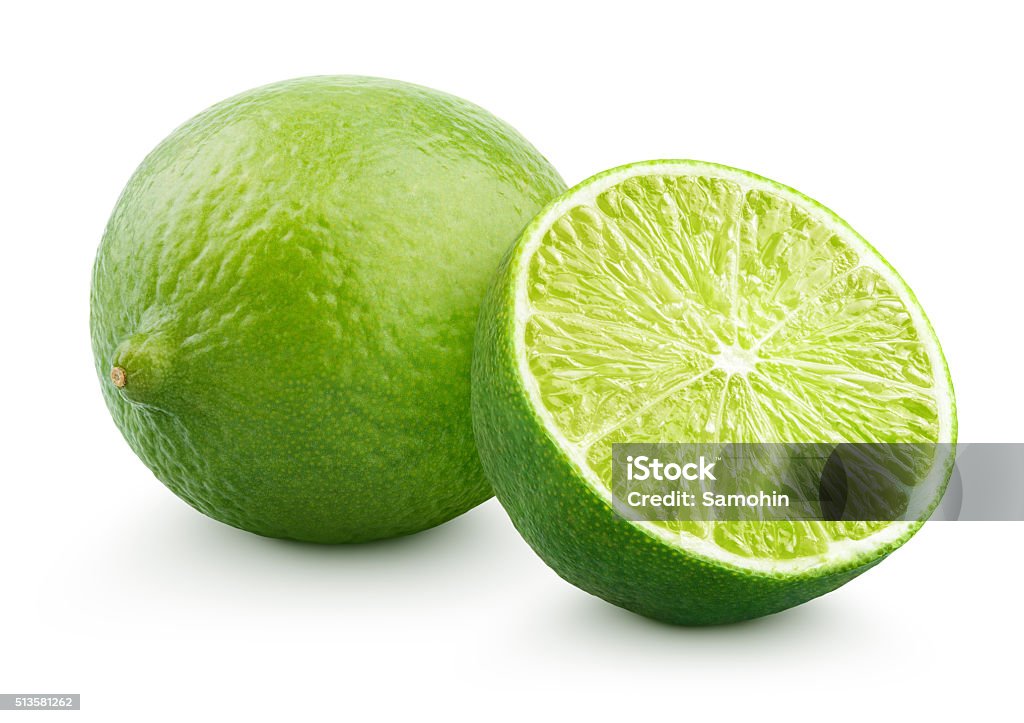 Fresh lime citrus fruit with half Fresh lime citrus fruit and half isolated on white background with clipping path Citrus Fruit Stock Photo