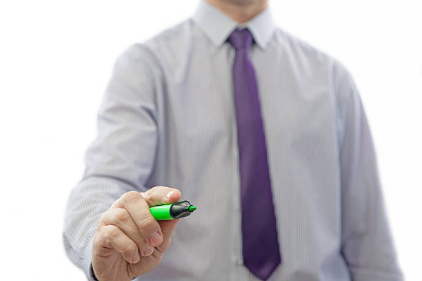 writing markers The manager or the teacher writing on the glass man writing on white board stock pictures, royalty-free photos & images