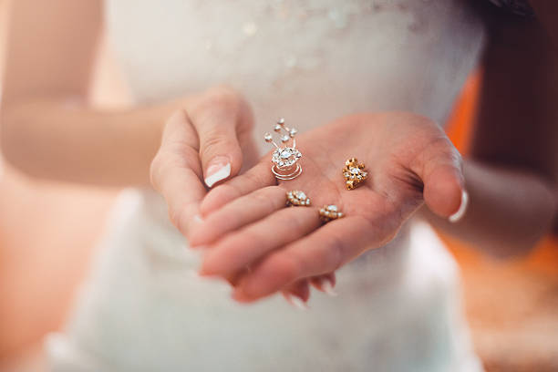 istock Bride is holding the beautiful  jewelry 513583266