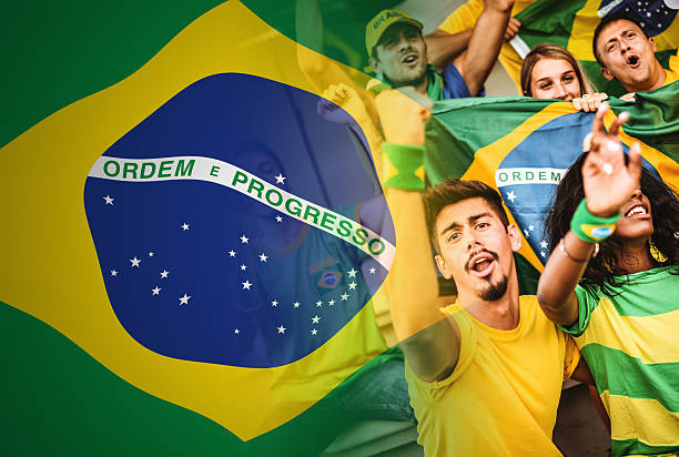 istock Group of brazilian supporters at stadium 513585608