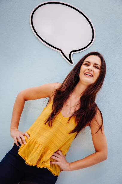 istock Pretty lady with beautiful smile and speech bubble 513585616