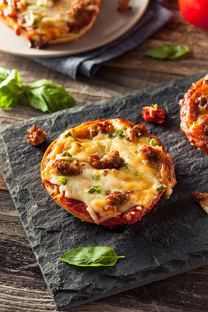 istock Sausage and Pepper Pizza Bagels 513585852