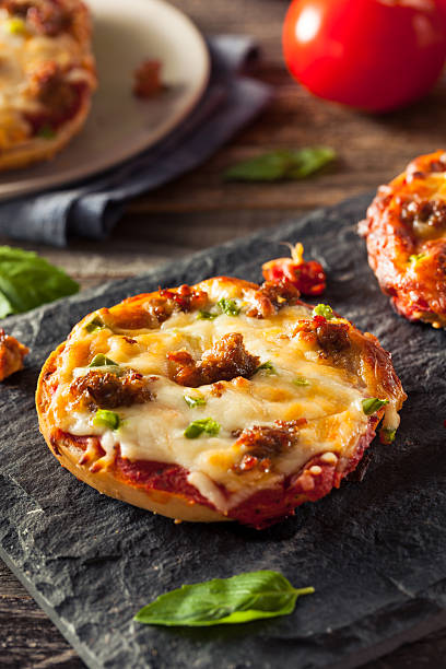 istock Sausage and Pepper Pizza Bagels 513585860