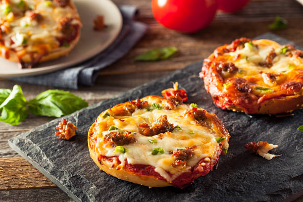 istock Sausage and Pepper Pizza Bagels 513585902
