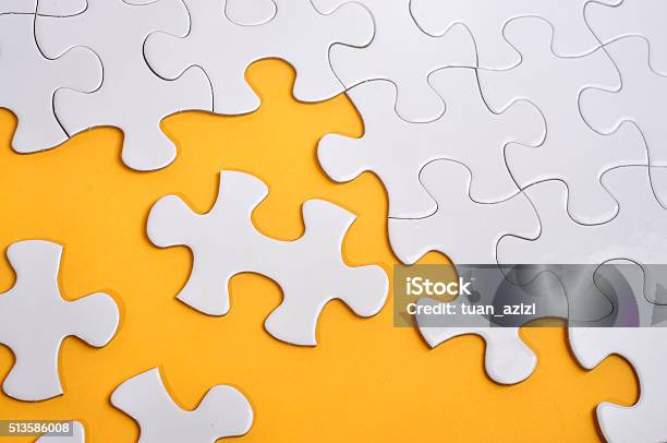 Missing Puzzle On Yellow Background Searching A Solution Concept Stock Photo - Download Image Now