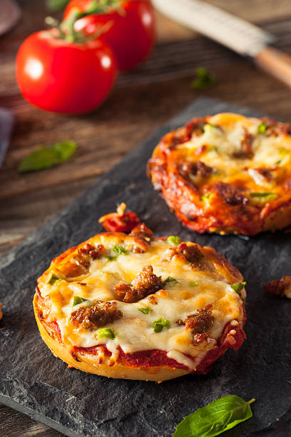 istock Sausage and Pepper Pizza Bagels 513586130