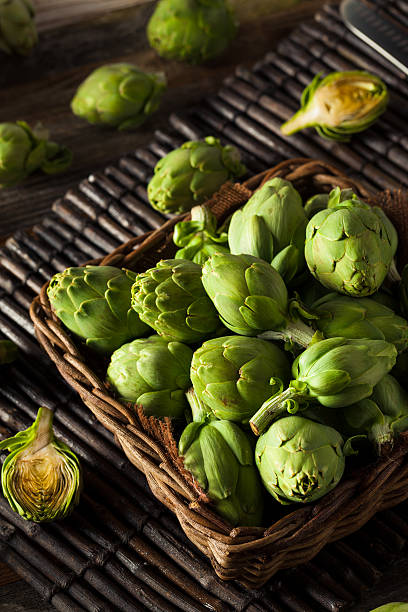 istock Raw Organic Green Baby Artichokes 513586506