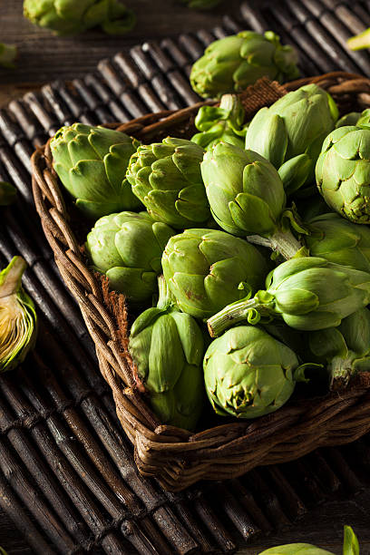 istock Raw Organic Green Baby Artichokes 513586538