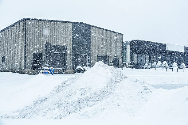 Blizzard Snow Storm Industrial Warehouse Office Building stock photo