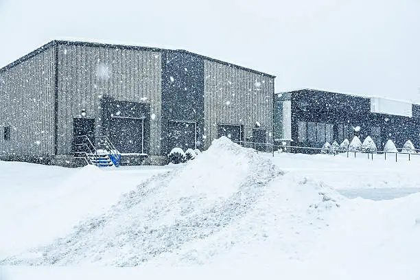 Photo of Blizzard Snow Storm Industrial Warehouse Office Building