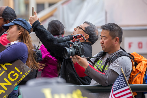 San Francisco, California, USA - February 20, 2016: Nearly 10,000 mostly Asian-American protesters rallied in San Francisco Market Street for former NYPD Officer Peter Liang, claiming that the rookie cop was a “pawn” of anti-police politics and was wrongly prosecuted for a tragic accident.
