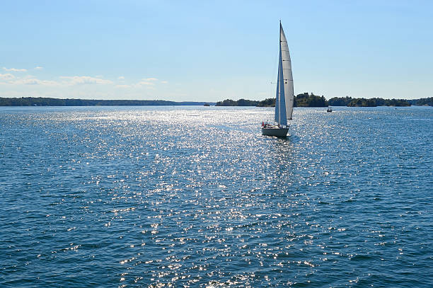 Yachts at 1000 Islands Yachts at 1000 Islands and Kingston in Ontario, Canada kingston harbour stock pictures, royalty-free photos & images