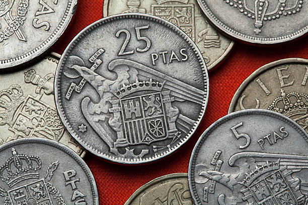 istock Coins of Spain. Spanish state emblem under Franco 513589938