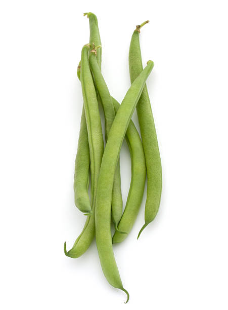 istock Green beans handful isolated on white background cutout 513592634