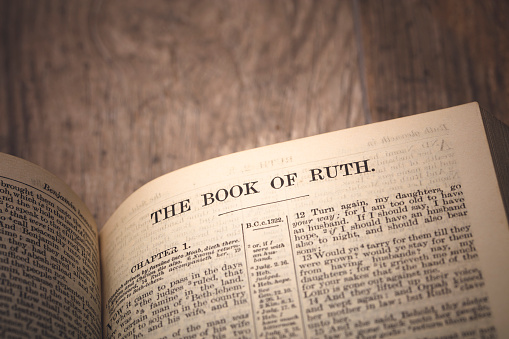 A stock photograph of a page of the bible. Photographed at 50mp with the Canon 5DSR and Canon 100mm f2.8 L IS lens. Focused on the book of Ruth.