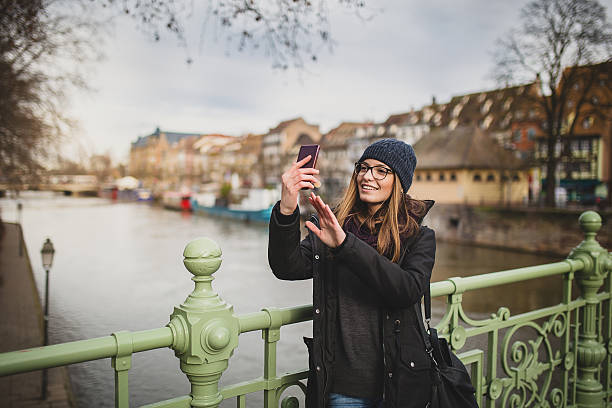istock Woman looking at mobile phone 513600716
