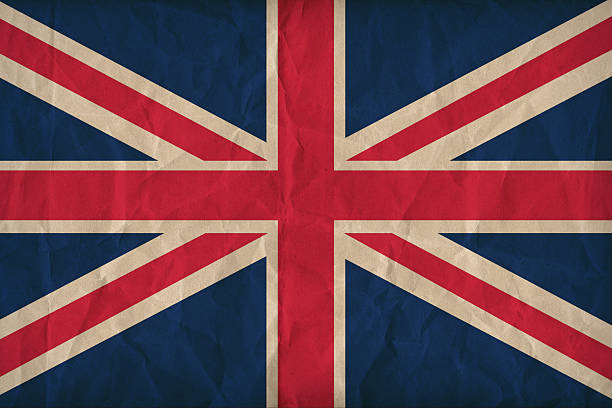 istock United Kingdom flag pattern on the paper texture ,retro style 513600885